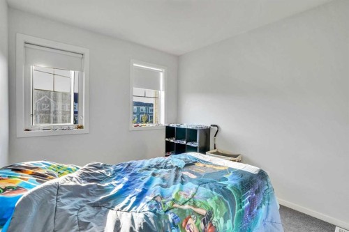 216 Windbury Lane Sw, Airdrie, AB - Indoor Photo Showing Bedroom