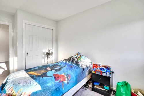 216 Windbury Lane Sw, Airdrie, AB - Indoor Photo Showing Bedroom