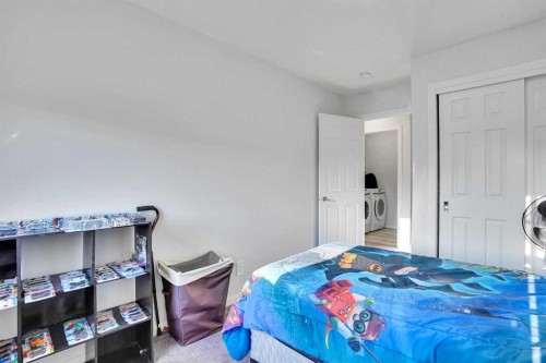 216 Windbury Lane Sw, Airdrie, AB - Indoor Photo Showing Bedroom
