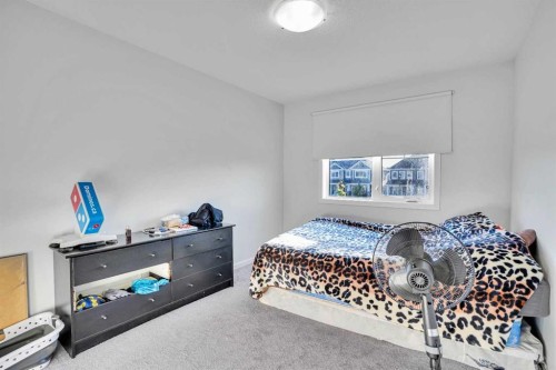 216 Windbury Lane Sw, Airdrie, AB - Indoor Photo Showing Bedroom