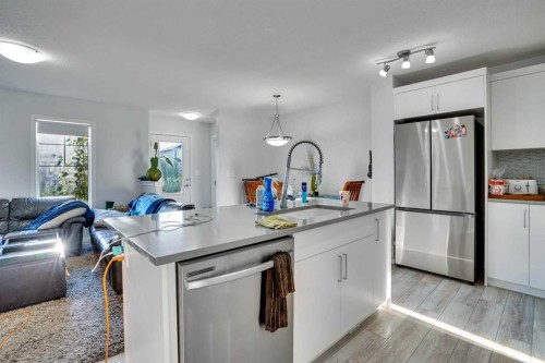 216 Windbury Lane Sw, Airdrie, AB - Indoor Photo Showing Kitchen With Stainless Steel Kitchen