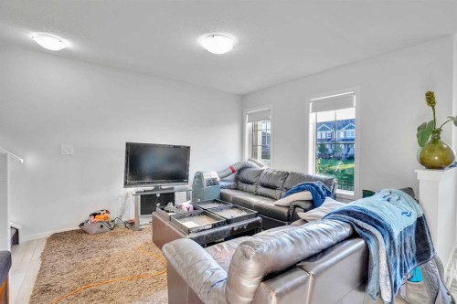 216 Windbury Lane Sw, Airdrie, AB - Indoor Photo Showing Living Room
