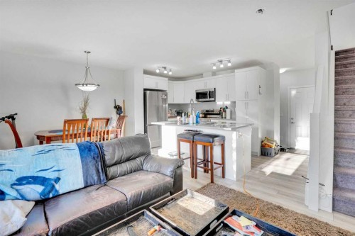 216 Windbury Lane Sw, Airdrie, AB - Indoor Photo Showing Living Room