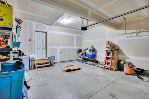216 Windbury Lane Sw, Airdrie, AB - Indoor Photo Showing Garage