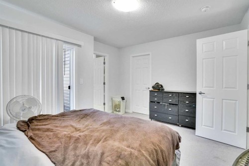 216 Windbury Lane Sw, Airdrie, AB - Indoor Photo Showing Bedroom