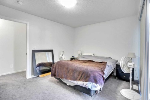216 Windbury Lane Sw, Airdrie, AB - Indoor Photo Showing Bedroom