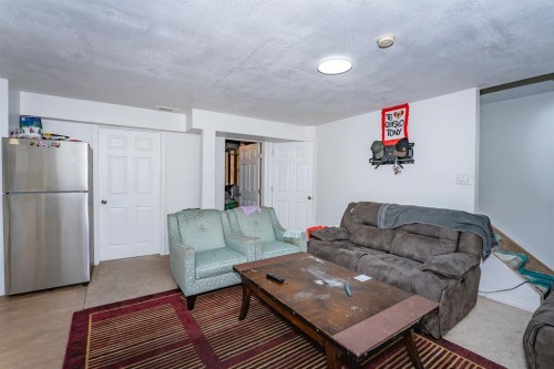 714 Martindale Boulevard Ne, Calgary, AB - Indoor Photo Showing Living Room