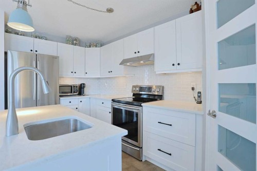 18 Citadel Vista Green Nw, Calgary, AB - Indoor Photo Showing Kitchen With Stainless Steel Kitchen