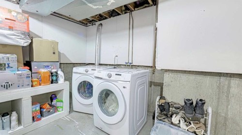 559 Abinger Road Ne, Calgary, AB - Indoor Photo Showing Laundry Room