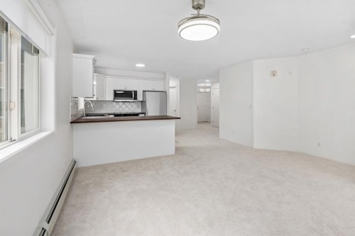 2205-7451 Springbank Boulevard Sw, Calgary, AB - Indoor Photo Showing Kitchen