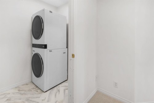 2205-7451 Springbank Boulevard Sw, Calgary, AB - Indoor Photo Showing Laundry Room