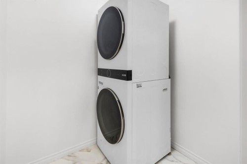 2205-7451 Springbank Boulevard Sw, Calgary, AB - Indoor Photo Showing Laundry Room