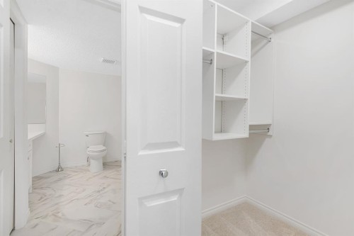 2205-7451 Springbank Boulevard Sw, Calgary, AB - Indoor With Storage