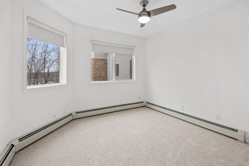 2205-7451 Springbank Boulevard Sw, Calgary, AB - Indoor Photo Showing Other Room