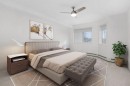 2205-7451 Springbank Boulevard Sw, Calgary, AB  - Indoor Photo Showing Bedroom 