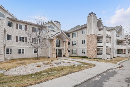 2205-7451 Springbank Boulevard Sw, Calgary, AB - Outdoor With Facade