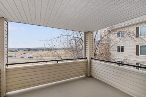 2205-7451 Springbank Boulevard Sw, Calgary, AB - Outdoor With Balcony