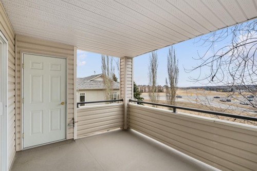 2205-7451 Springbank Boulevard Sw, Calgary, AB - Outdoor With Balcony With Exterior