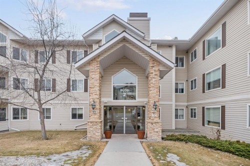 2205-7451 Springbank Boulevard Sw, Calgary, AB - Outdoor With Facade
