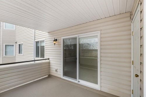 2205-7451 Springbank Boulevard Sw, Calgary, AB - Outdoor With Balcony With Exterior