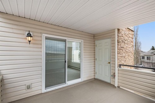 2205-7451 Springbank Boulevard Sw, Calgary, AB - Outdoor With Exterior