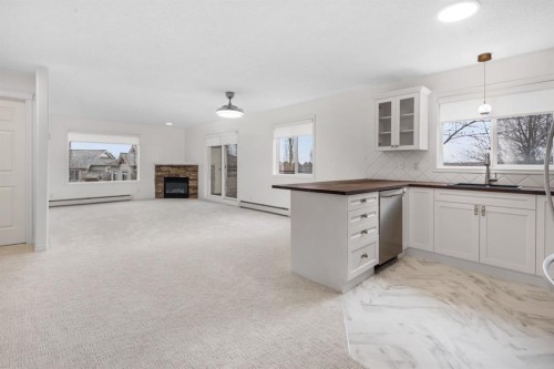 2205-7451 Springbank Boulevard Sw, Calgary, AB - Indoor Photo Showing Kitchen