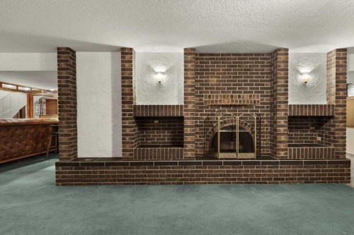 1521 92 Avenue Sw, Calgary, AB - Indoor With Fireplace
