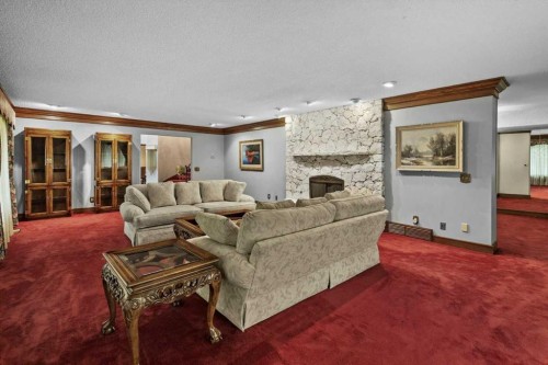 1521 92 Avenue Sw, Calgary, AB - Indoor Photo Showing Living Room With Fireplace
