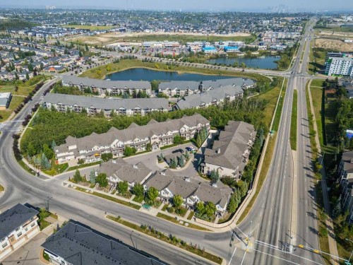 2206-211 Aspen Stone Boulevard Sw, Calgary, AB - Outdoor With Body Of Water With View