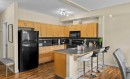 2206-211 Aspen Stone Boulevard Sw, Calgary, AB  - Indoor Photo Showing Kitchen 