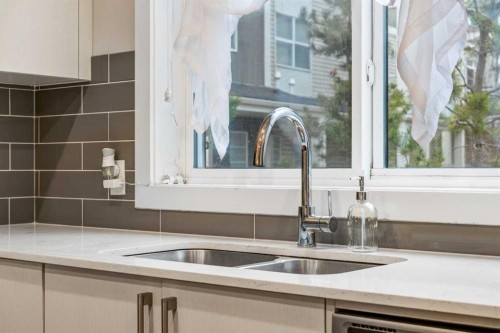 716 Redstone Crescent Ne, Calgary, AB - Indoor Photo Showing Kitchen With Double Sink