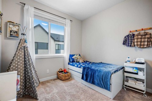 716 Redstone Crescent Ne, Calgary, AB - Indoor Photo Showing Bedroom