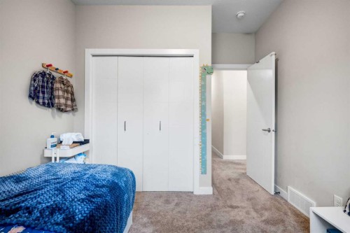 716 Redstone Crescent Ne, Calgary, AB - Indoor Photo Showing Bedroom