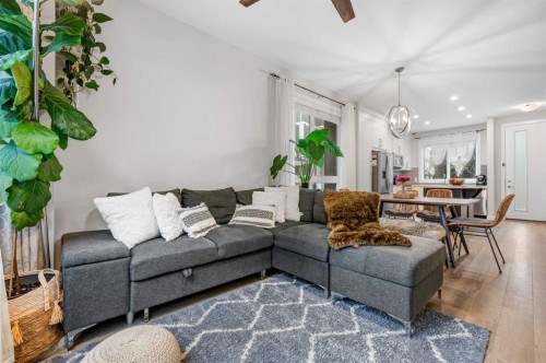 716 Redstone Crescent Ne, Calgary, AB - Indoor Photo Showing Living Room