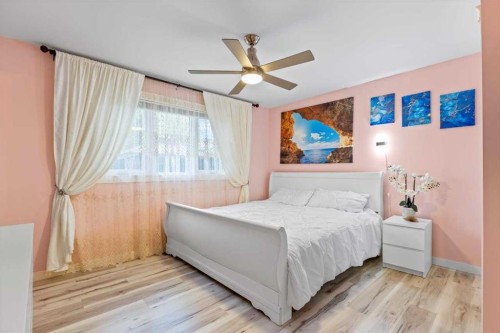 343 Queen Tamara Way Se, Calgary, AB - Indoor Photo Showing Bedroom