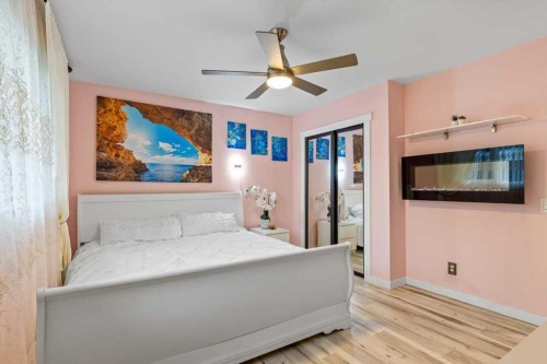 343 Queen Tamara Way Se, Calgary, AB - Indoor Photo Showing Bedroom