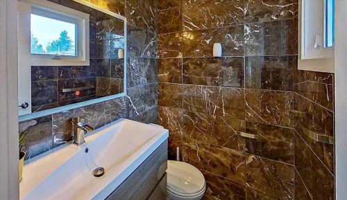 343 Queen Tamara Way Se, Calgary, AB - Indoor Photo Showing Bathroom