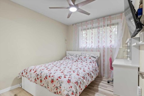343 Queen Tamara Way Se, Calgary, AB - Indoor Photo Showing Bedroom