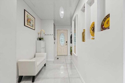 343 Queen Tamara Way Se, Calgary, AB - Indoor Photo Showing Other Room