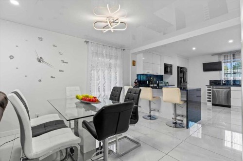 343 Queen Tamara Way Se, Calgary, AB - Indoor Photo Showing Dining Room