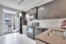 306 Ascot Circle Sw, Calgary, AB  - Indoor Photo Showing Kitchen With Double Sink 