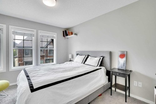 306 Ascot Circle Sw, Calgary, AB - Indoor Photo Showing Bedroom