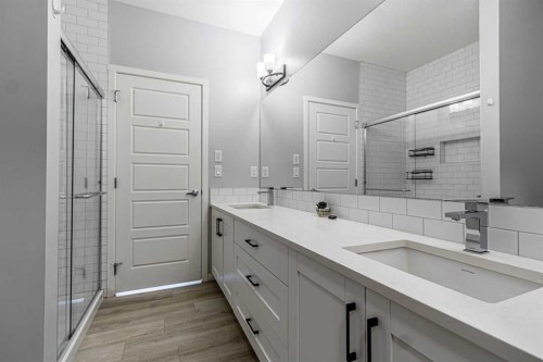 203-360 Harvest Hills Way Ne, Calgary, AB - Indoor Photo Showing Bathroom