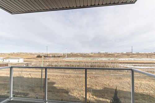 203-360 Harvest Hills Way Ne, Calgary, AB - Outdoor