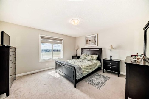 77 Red Sky Way Ne, Calgary, AB - Indoor Photo Showing Bedroom