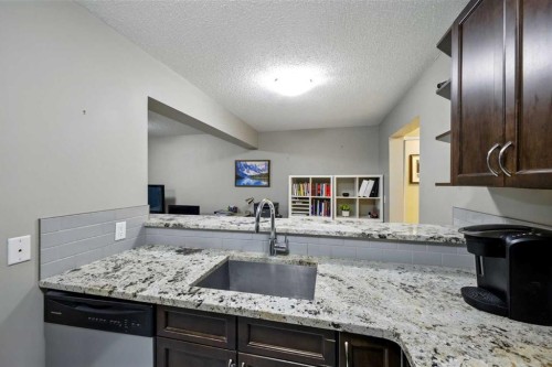 109-2204 1 Street Sw, Calgary, AB - Indoor Photo Showing Kitchen With Upgraded Kitchen