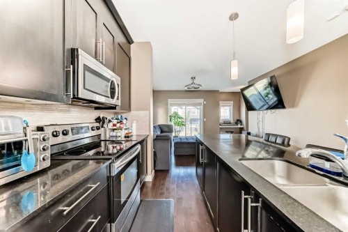 29 Skyview Point Link Ne, Calgary, AB - Indoor Photo Showing Kitchen With Stainless Steel Kitchen With Double Sink With Upgraded Kitchen