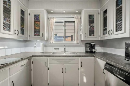 7815 36 Avenue Nw, Calgary, AB - Indoor Photo Showing Kitchen With Double Sink