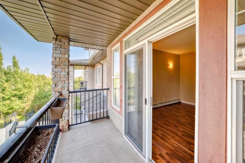 2210-211 Aspen Stone Boulevard Sw, Calgary, AB - Outdoor With Exterior