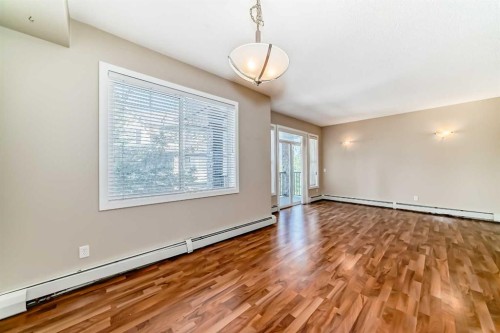 2210-211 Aspen Stone Boulevard Sw, Calgary, AB - Indoor Photo Showing Other Room